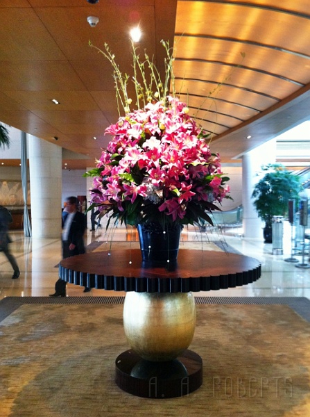 sh1.jpg - I was actually in Shanhai twice.  The first time was for 3 weeks of work.  The second time was to tour Shanghai with Liz.  Liz and I stayed in the Weston in downtown Shanghai.  This is a 5 star hotel where she got a room from around $100 a night!  It was awesome.  This floral arrangement greets you in the massive lobby.