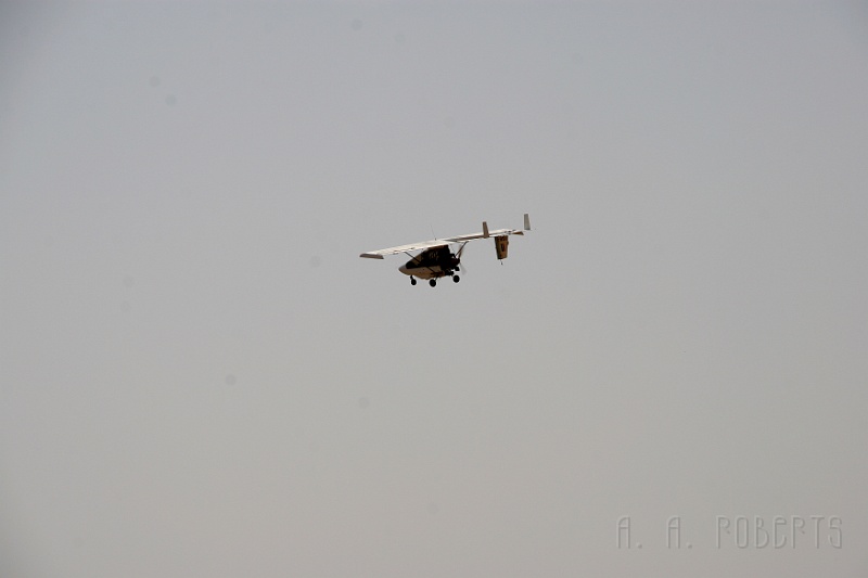 IMG_6282.JPG - Ok... why do I have a photo of an ultralight in here?  Because he buzzed us on the rooftop!