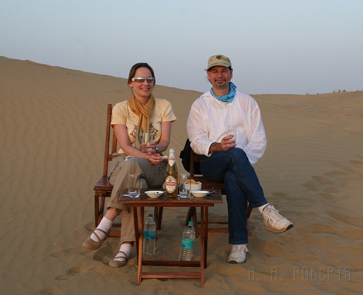 IMG_6485.JPG - Time for the intrepid explorer and his wife have a beer out on the dunes bit...  Anyone who rides a gaseous camel deserves the title intrepid explorer.  Hey that thing could have blown at any time!  Of course my wife will tell you that it did.