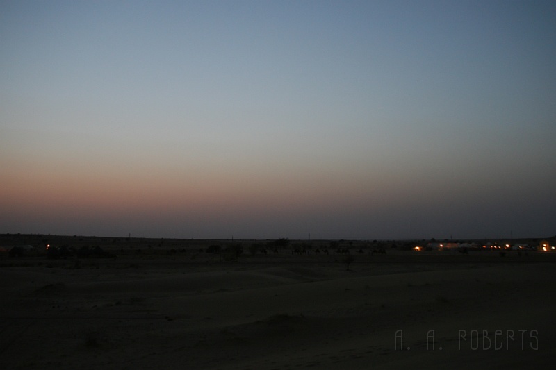 IMG_6547.JPG - And as the sun set all the camels head back to their stables or whatever it is that they head back to.