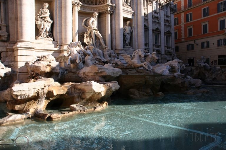 IMG_4043.jpg - This is the Trevi fountain one of the most famous fountains in the world.  They say if you throw a coin in you'll come back to Rome.  I think this started this whole craze of throwing coins in fountains which is very annoying if you have a little fountain in your front yard and the last thing you want is everyone throwing their blasted pennies in it, scaring the fish, scaring the frogs and clogging up the works!  Not that I have one...