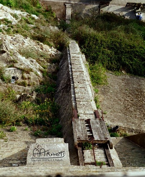 mont18.jpg - That's the elevator skid at the bottom.  A bunch of monks got in a gerble wheel up at the top and walked to haul stuff up.